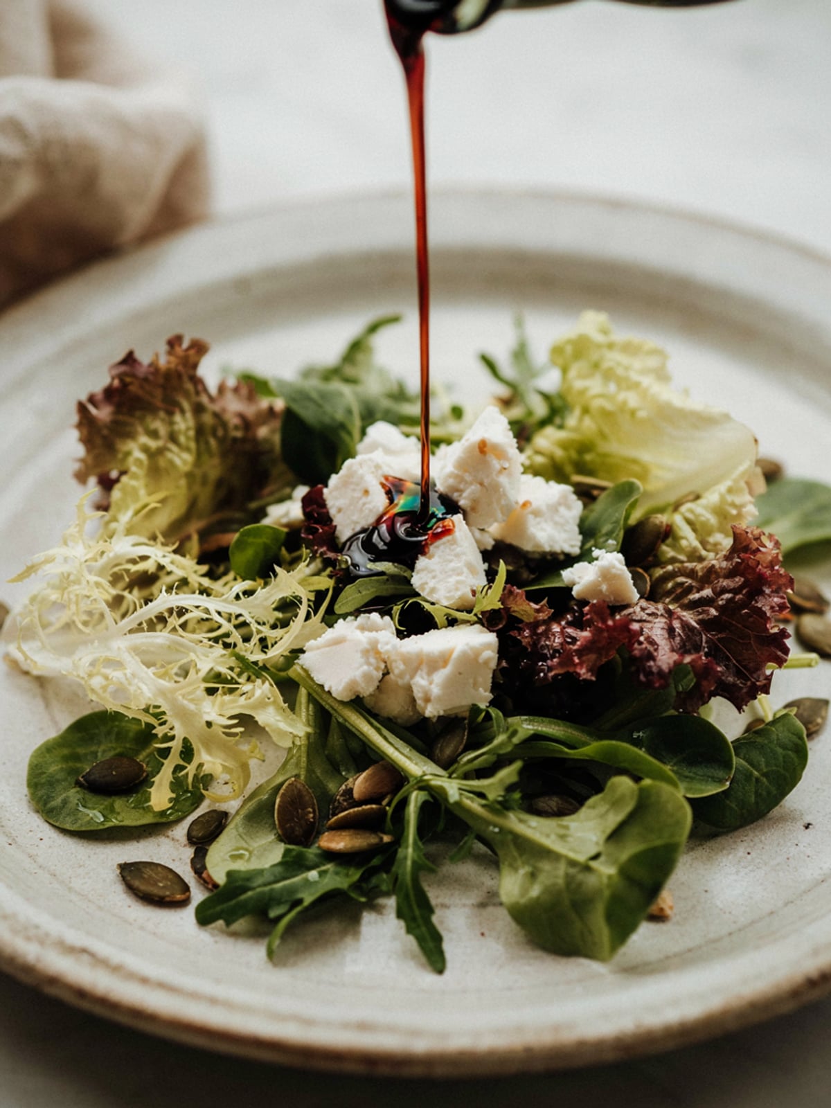 Insalata di caprino con olio di zucca